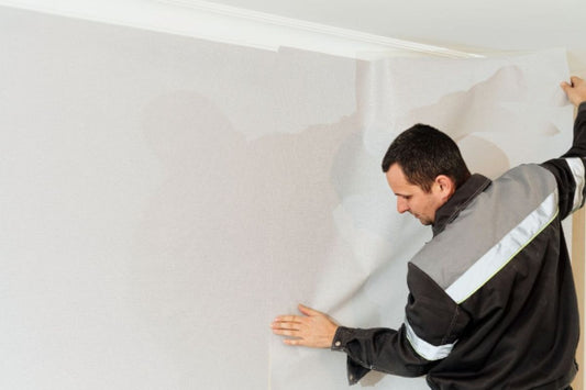 Décoller du papier peint vinyl et imperméable