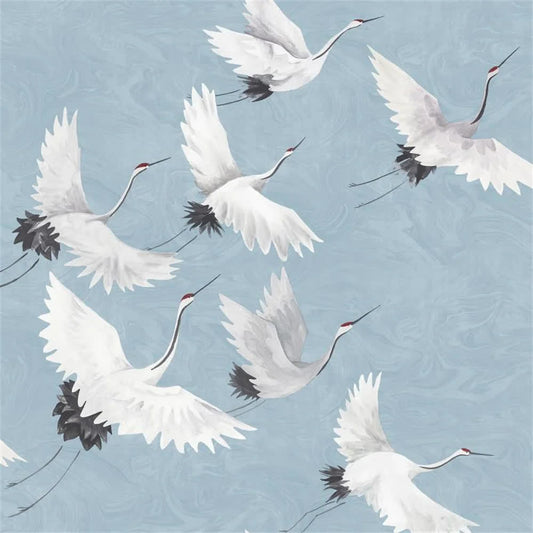 Papier peint envol des grues japonaises fond bleu